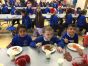 P4 Mr  Mc Creesh’s class enjoy their Christmas Dinner 🍽️ 