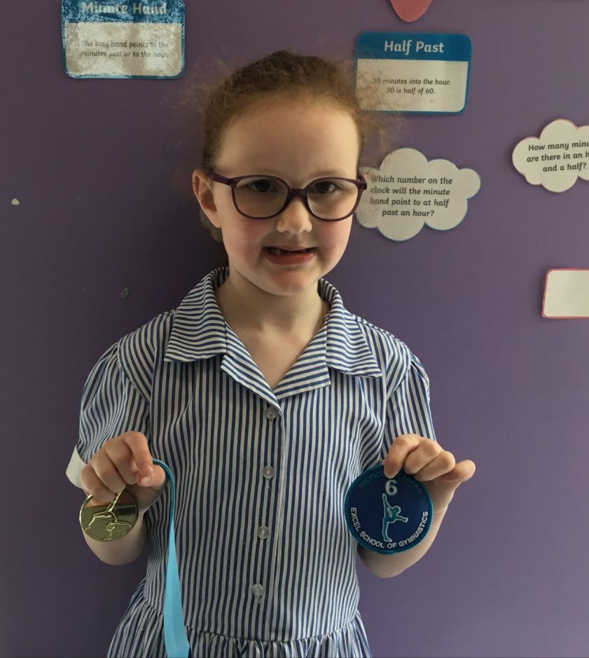 A winning gymnast at Excel Gymnastic Academy
